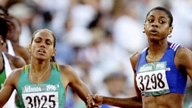 29 Jul 1996: The finish of the 400m Gold to Marie Jose Perec from france and silver to Cathy Freeman Australia at the Olympic Stadium at the 1996 Centennial Olympic Games in Atlanta, Georgia.