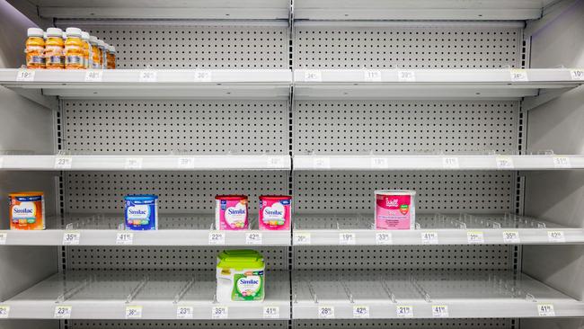 Shelves normally meant for baby formula sit nearly empty at a store in downtown Washington, DC in May. Picture: Samuel Corum / AFP