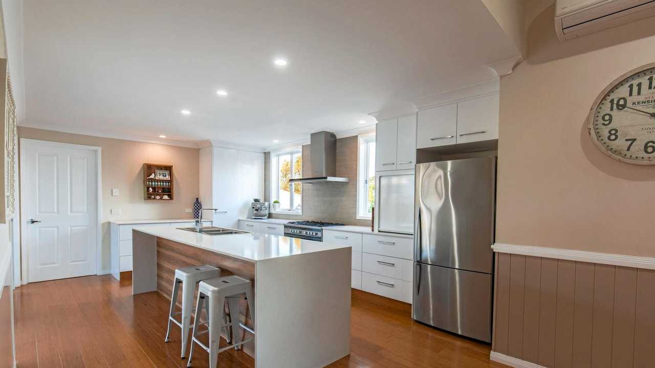 AFTER: The kitchen's modern makeover.