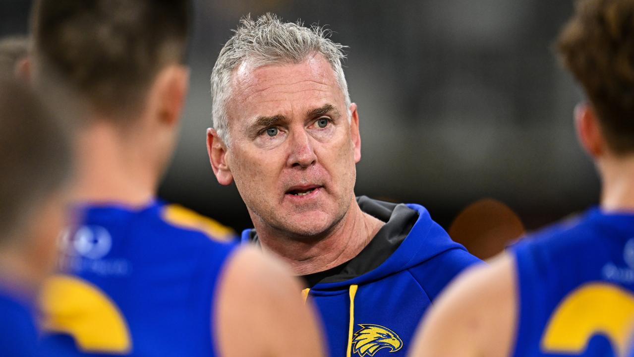 PERTH, AUSTRALIA - AUGUST 12: Adam Simpson, Senior Coach of the Eagles addresses his team and staff at the break during the 2023 AFL Round 22 match between the West Coast Eagles and the Fremantle Dockers at Optus Stadium on August 12, 2023 in Perth, Australia. (Photo by Daniel Carson/AFL Photos via Getty Images)