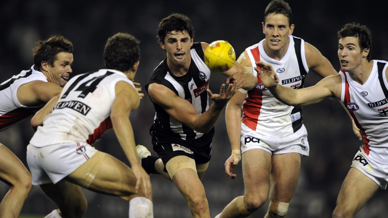 Collingwood v St Kilda. Etihad Stadium. Scott Pendlebury trapped by Adam Schneider, Luke Ball, Jason Blake and Lenny Hayes.