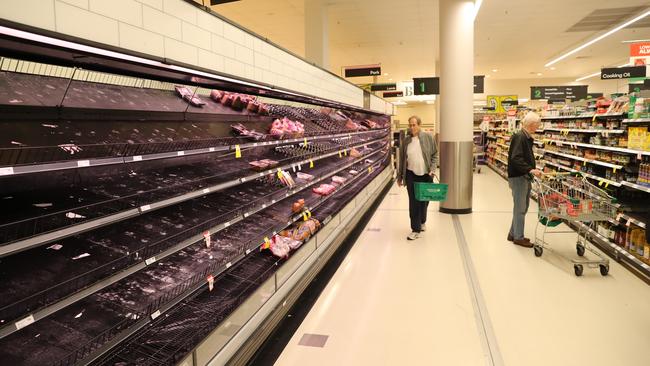 Meat all but gone for an early morning shopper at Woolworths in Crows Nest, Sydney. Picture: Rohan Kelly