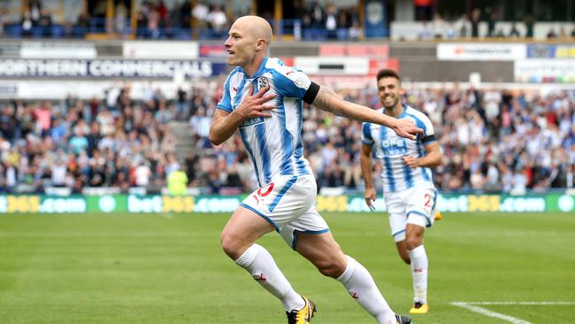 Aaron Mooy celebrates scoring his first Premier League goal.