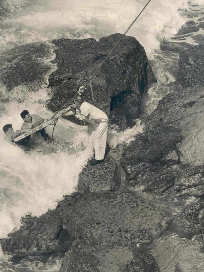 1953: Harry Ware trains police rescue recruits in surf rescue techniques at Clovelly, New South Wales.