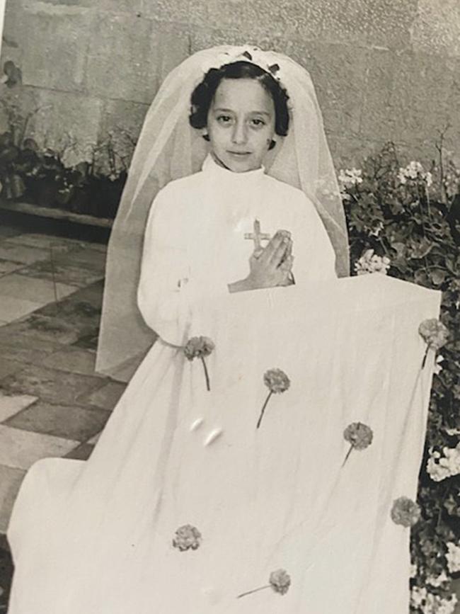 Carole Haddad, aged 8, at her First Holy Communion, in Lebanon, in 1972. Photo: Supplied.