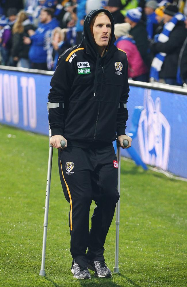 Steve Morris on crutches after the game. Picture: Getty Images