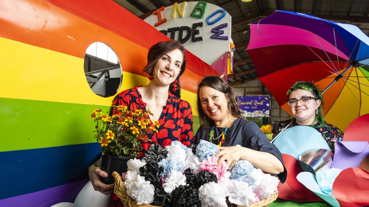 Helping prepare the Pride float are (from left) Courtney Ruler, Annette Bromdal and Mickey Berry for the grand parade of Carnival of Flowers 2022. Picture: Kevin Farmer