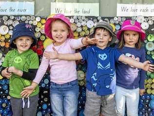 Eli Howell, Abby Ryan, George Micallef and Sophia Peterie give a wave at their day at Cubby House for Kids in Townsend. Picture: Adam Hourigan