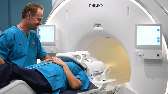 Operators Ian Reynolds and Nikki De Leon demonstrate a new next generation Ingenia Ambition 1.5T MRI machine at Nepean Hospital. Picture: AAP/Joel Carrett