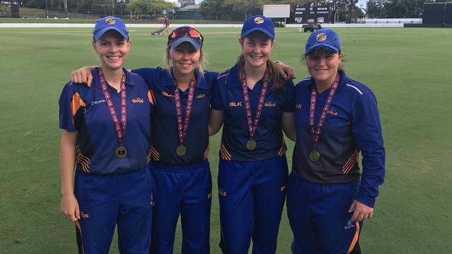 Winners are grinners for Sandgate-Redcliffe as Kristen Davey, Olivia Roche, Julia Cavanough, and Caitlin Mair enjoy the Raymont Shield win.