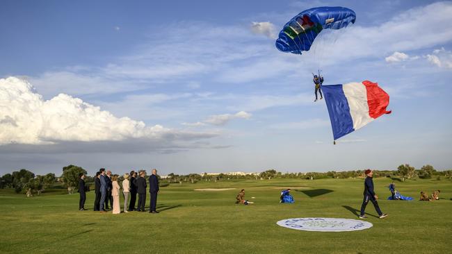 G7 leaders watch a skydiving demonstration. Picture: Getty Images