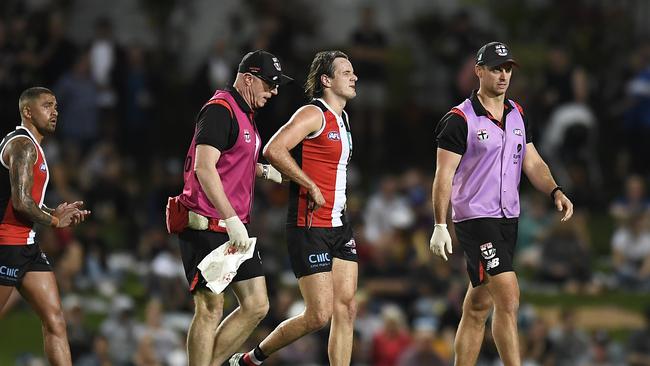 St Kilda’s Hunter Clark leaves the field with a broken jaw. Picture: AFL Photos/via Getty Images