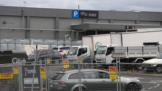 Tradies’ vehicles and delivery trucks crowded the outdoor carpark today. Picture: Zak Simmonds