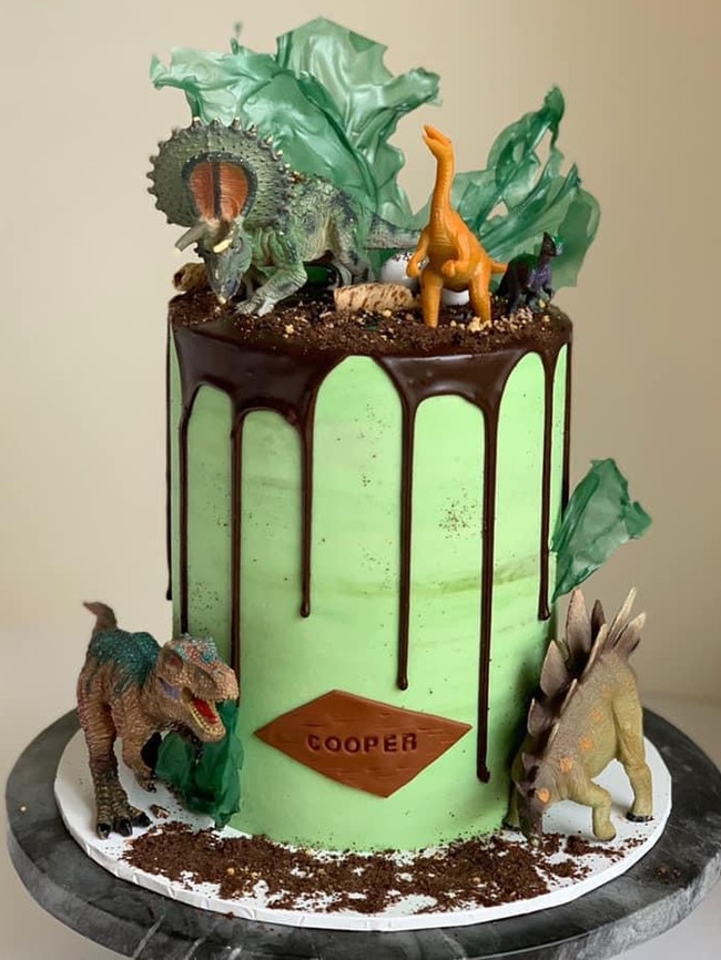 Dinosaur themed cake by She Baked.