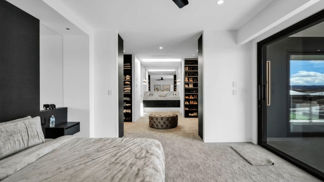 The home has three bedrooms and two bathrooms. Pictured is the main bedroom. Picture: Zanetto Builders/Supplied