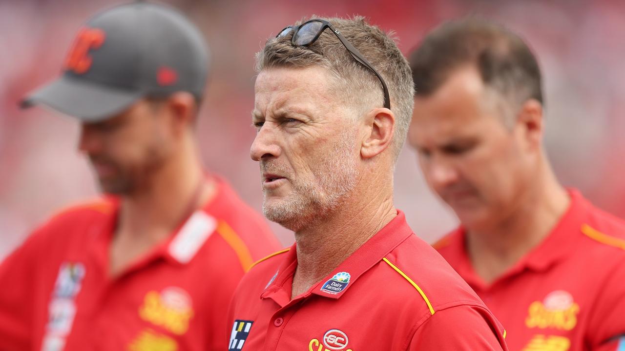 SYDNEY, AUSTRALIA - APRIL 21: Damien Hardwick, Senior Coach of the Suns talks to players during quarter time during the round six AFL match between Sydney Swans and Gold Coast Suns at SCG, on April 21, 2024, in Sydney, Australia. (Photo by Mark Metcalfe/AFL Photos/via Getty Images )