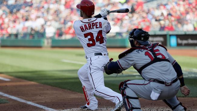 Harper hits slam, becomes 8th-youngest player to 100 HRs