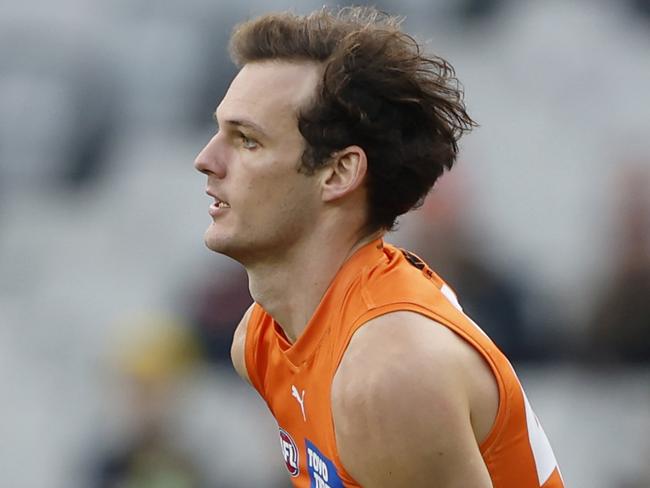 MELBOURNE, AUSTRALIA - JULY 14: Jack Buckley of the Giants runs with the ball during the round 18 AFL match between Richmond Tigers and Greater Western Sydney Giants at Melbourne Cricket Ground, on July 14, 2024, in Melbourne, Australia. (Photo by Darrian Traynor/AFL Photos/via Getty Images)