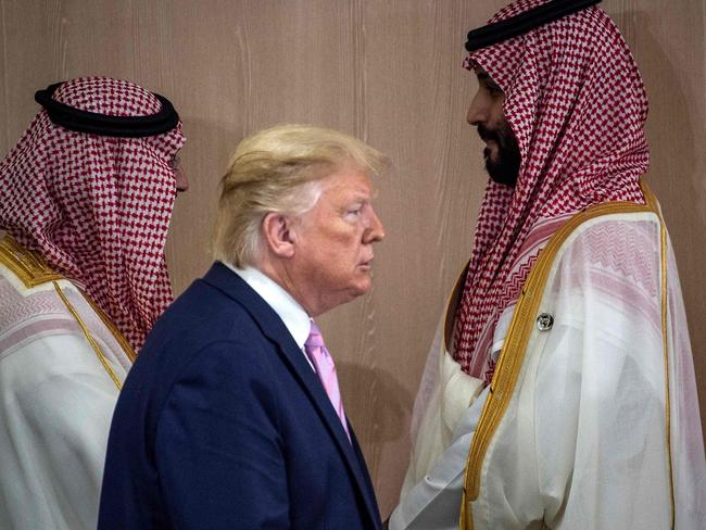 (FILES) US President Donald Trump and Saudi Arabia's Crown Prince Mohammed Bin Salman (R) arrive for a meeting on 