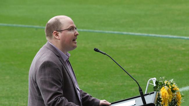 Graham Pegg, Duncan Pegg’s brother, speaks at the public funeral on Saturday at the Gabba, Brisbane. Picture: Liam Kidston