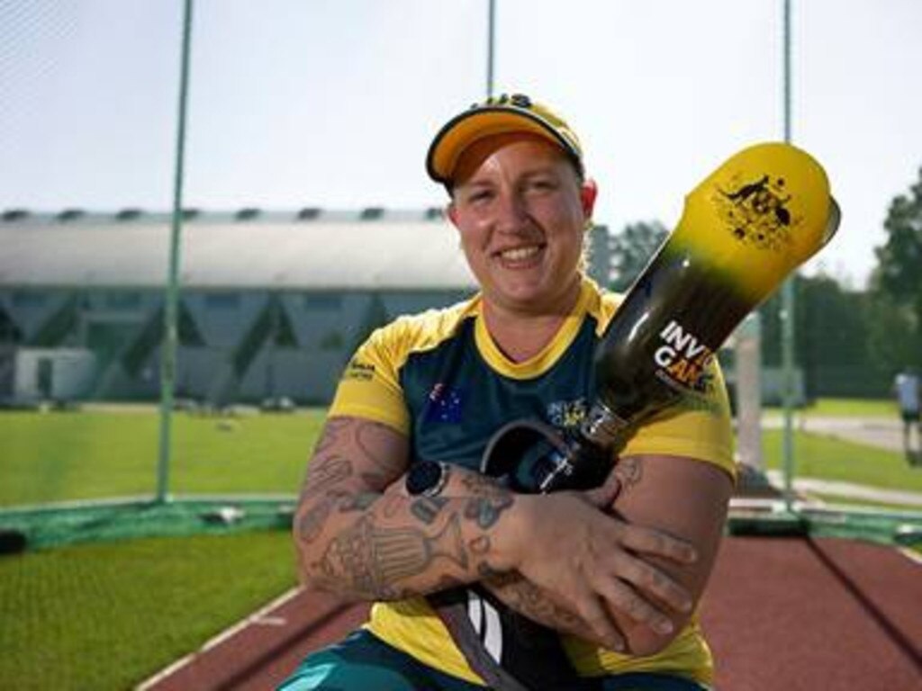 Giru woman Ainsley Hooker with her Australian and Invictus-themed prosthetic leg.