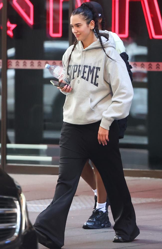 Dua Lipa leaving Barry’s Bootcamp gym at Martin Place after a workout with her tour crew. Picture: KHAP/BACKGRID
