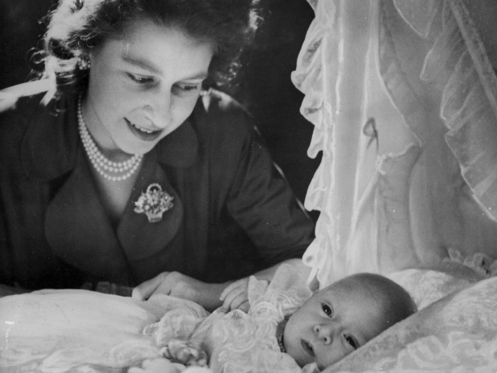 Princess Elizabeth looks lovingly at her baby son Prince Charles in an image from 1948. Her first child and heir was born on November 14 at Buckingham Palace. Cheering crowds gathered at the gates as the official announcement was made that night, and newspapers quoted a palace insider as saying the newborn was “a lovely boy, a really splendid baby”.