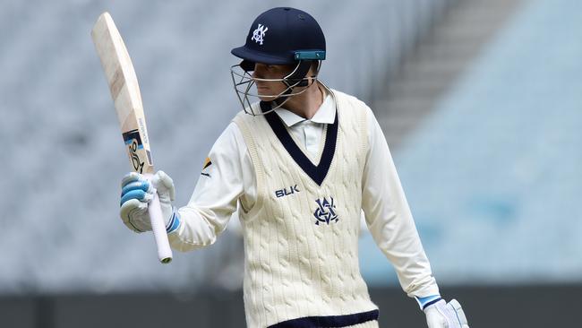 Victorian batsman Peter Handscomb celebrates bringing up 50 against South Australia this week.