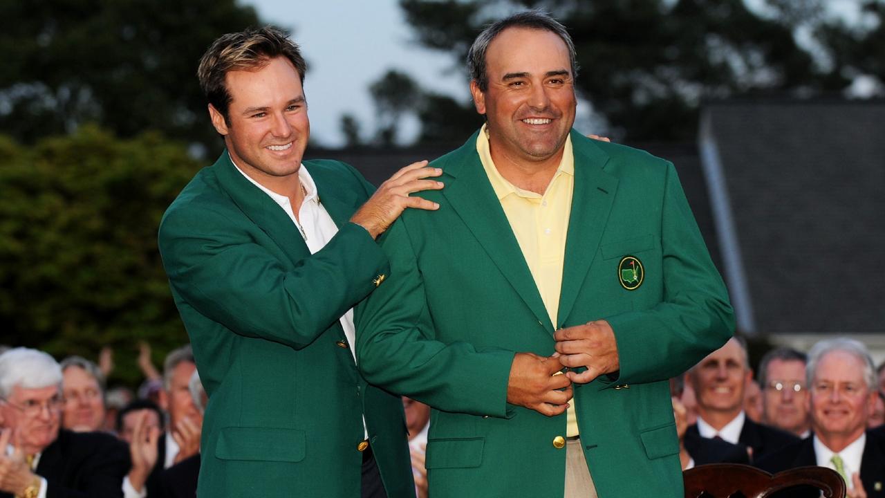 Trevor Immelman awards Angel Cabrera his green jacket after the Argentine won the 2009 Masters. Photo: Harry How/Getty Images/AFP