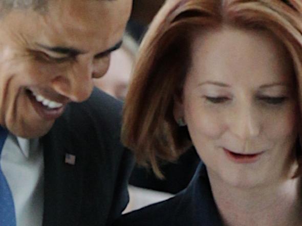 17/11/2011 NEWS: POOL PHOTO: President of the United States Barack Obama and Prime Minister of Australia Julia Gillard exit the House of Representatives after President Obama's address at Parliament House Canberra on Thursday 17 November 2011. Photo: Alex Ellinghausen (POOL FOR FAIRFAX/NEWS LTD ONLY)