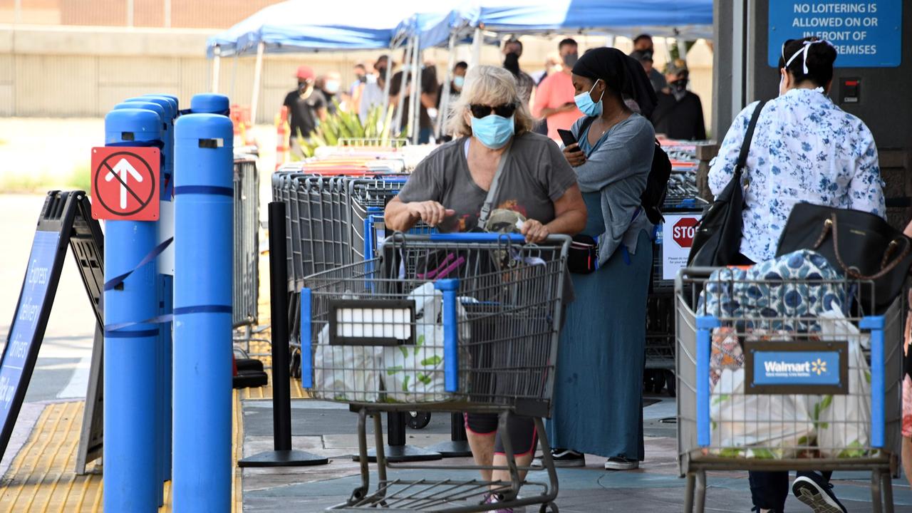 Some experts have argued America reopened too quickly. (Photo by Robyn Beck / AFP)