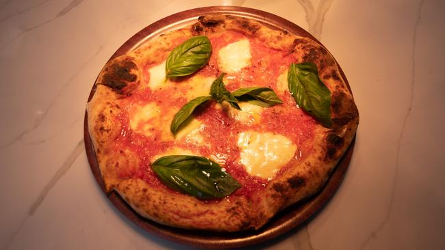 Stefano Manfredi believes the secret to his pizza is in the base.