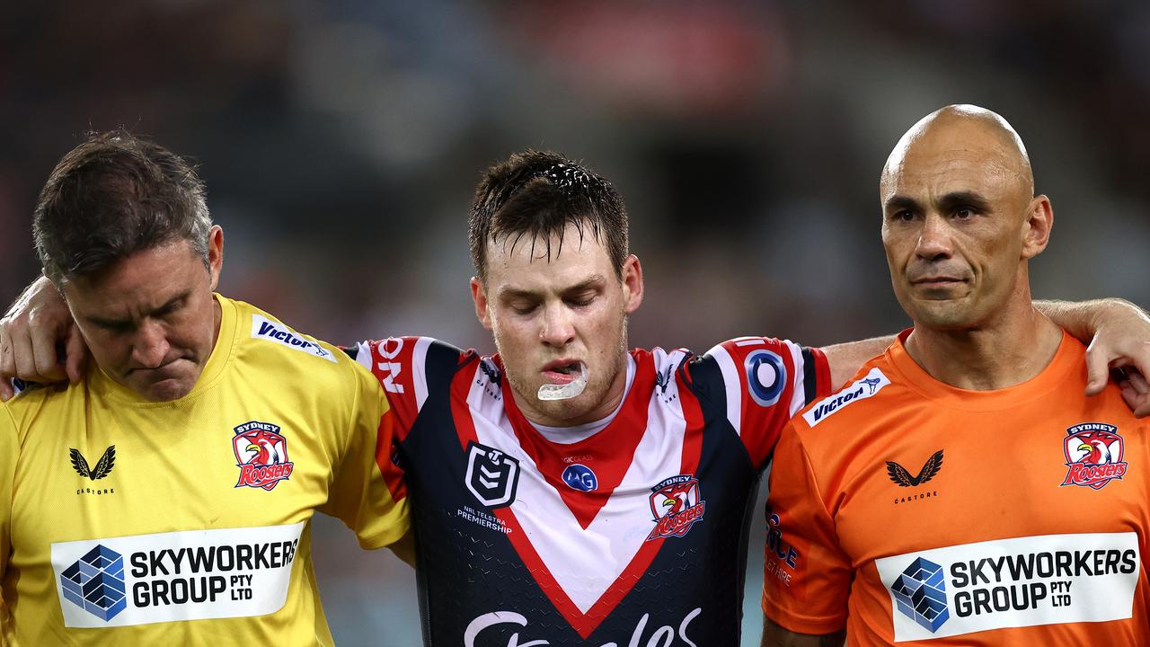 Luke Keary is helped off the field