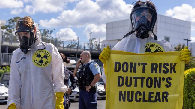 Activists dressed in hazmat suits and gas masks staged the clean up with Geiger counters during Peter Dutton’s election launch. Picture: NewsWire handout