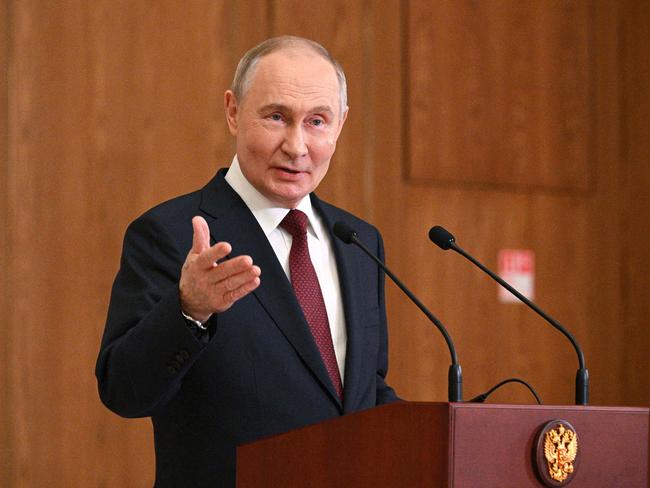 In this pool photograph distributed by the Russian state agency Sputnik, Russia's President Vladimir Putin gestures as he addresses the press after attending a meeting of the Collective Security Treaty Organization (CSTO) in Astana, on November 28, 2024. Russian President Vladimir Putin arrived in Kazakhstan on November 27, 2024, for a two-day trip aimed at shoring up ties with his Central Asian allies as tensions mount over the Ukraine war. Kazakhstan is a member of the Moscow-led CSTO security alliance but has expressed concern about the almost three-year conflict, which Kazakh President Kassym-Jomart Tokayev has refused to condone. (Photo by Ramil SITDIKOV / POOL / AFP)