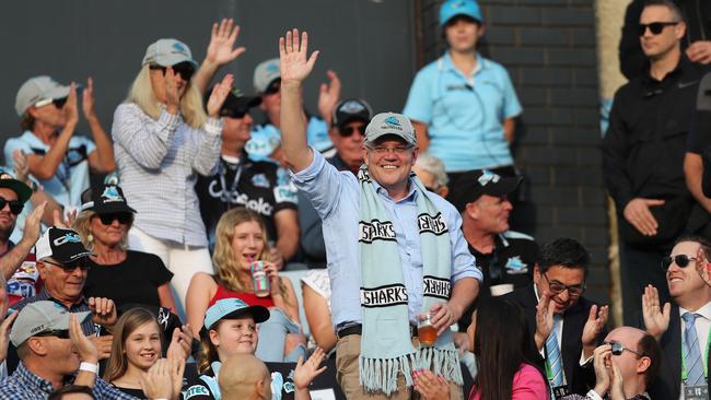 Prime Minister of Australia Scott Morrison waves to the crowd on arrival to the Cronulla v Manly NRL match at PointsBet Stadium, Cronulla. Picture: Brett Costello