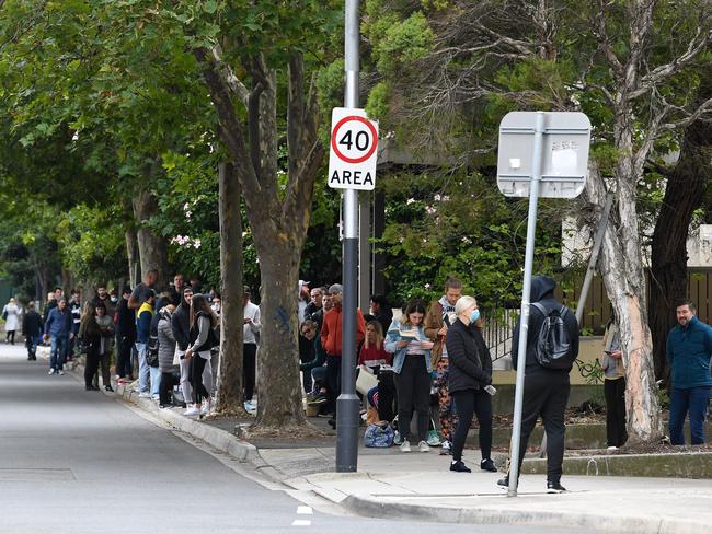 People are seen waiting in line at the Prahran Centrelink office in Melbourne. Picture: AAP