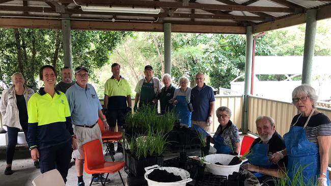 Ngioka Nursery volunteers, from right – Glennis THOMAS, Peter Thomas, Helen Brady, Peter Hearsum, Gwen Walsh, Jill Rogers, Richard, Graeme Ramsey, Bob Lisle (front blue shirt), Paul Lambert, Lyn Lambert. Supplied.