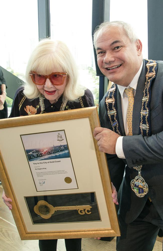 Gold Coast Bulletin social photographer Regina King presented with the Key to the City by Lord Mayor Tom Tate. Picture: Glenn Campbel