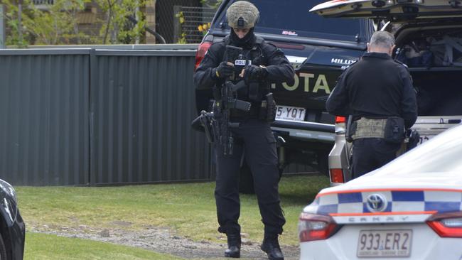 Officers from the Special Emergency Response Team on the scene of a standoff between police and an armed gunman at a Park St address in Newtown on December 21, 2022.