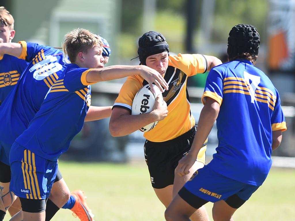 Boys Rugby League State Championship held at Northern Division, Brothers Leagues ground, Townsville. 14-15 years. Capricornia (gold) v South West (blue). George Gofton of St Patrick's College, Mackay.