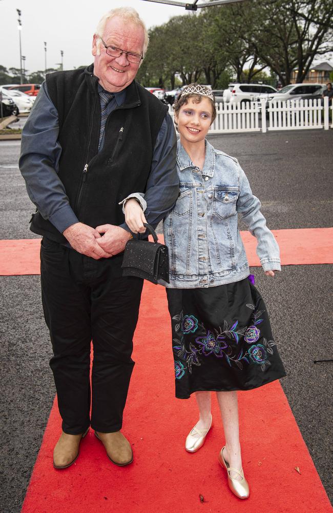 Graduate Charlotte Ebert with granddad Alan Crouther at Clifford Park Special School formal at Clifford Park Racecourse, Wednesday, November 20, 2024. Picture: Kevin Farmer