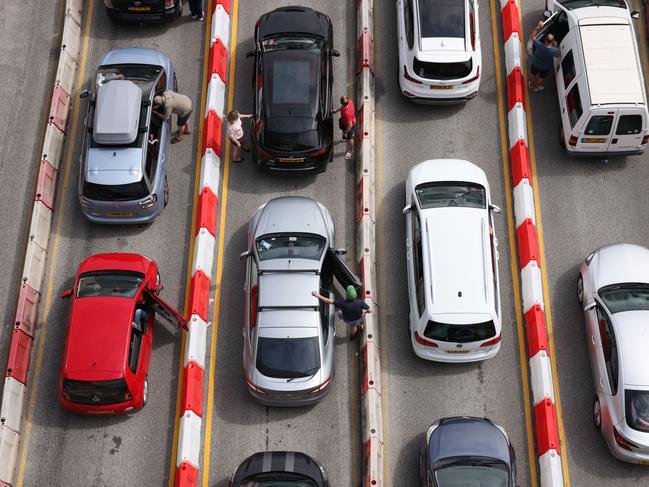 DOVER, ENGLAND - JULY 22: Vehicles queue at the Port of Dover on July 22, 2022 in Dover, England. The Port of Dover declared a Ã¢â¬Åcritical incidentÃ¢â¬Â today as queues built up due to inadequate staffing at French immigration controls. They said travellers should leave six hours to clear security.  (Photo by Dan Kitwood/Getty Images) *** BESTPIX ***