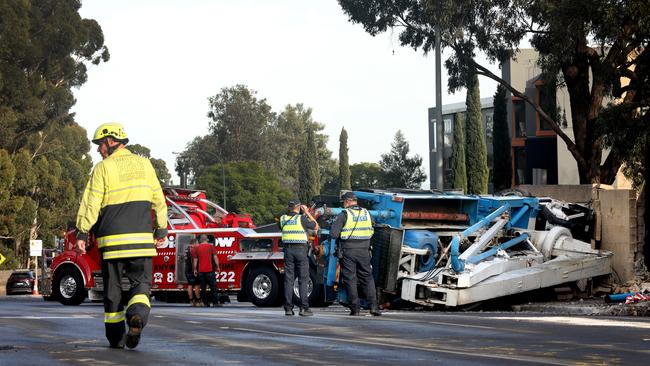 A tow truck is called in to take the damage truck away.. Picture: Dean Martin