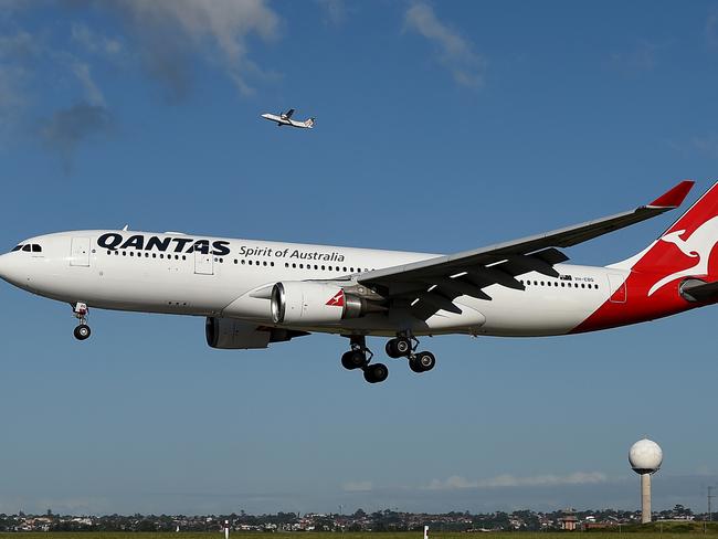 A Qantas Airbus A330 aircraft is seen at take-off at Sydney Domestic Airport, Monday, Nov. 16, 2015. (AAP Image/Dan Himbrechts) NO ARCHIVING