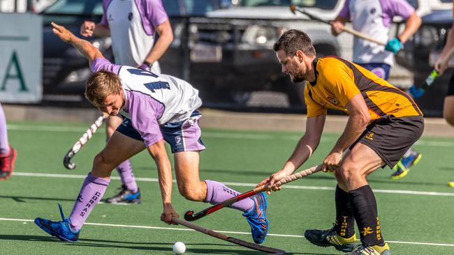 Commercial's Jared Taylor tries to tackle Easts' Matt Gohdes. Photo by Andrew Blanchard.