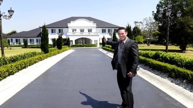 Agent Brad Wheatley showing off the Kenthurst home in 2013.