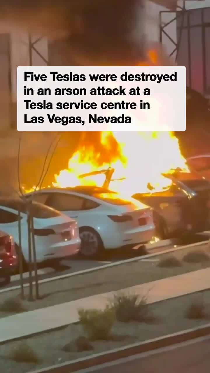 Teslas set on fire and shot at in arson attack