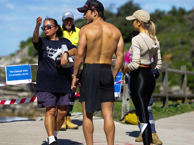 SYDNEY, AUSTRALIA - APRIL 10 2020: Rangers are advising locals that the Coastal Walk from Bondi to Coogee is now closed, in Bondi Sydney, Australia on April 10 2020. Photo by Gaye Gerard/ Sunday Telegraph