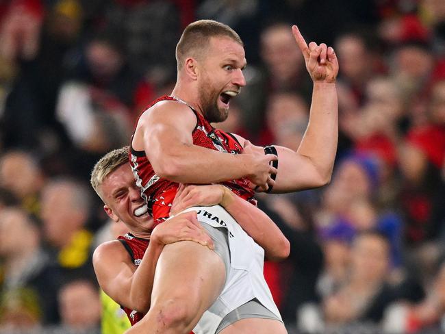 Debutant Nate Caddy and Jake Stringer celebrate a goal. Picture: Morgan Hancock/AFL Photos/via Getty Images